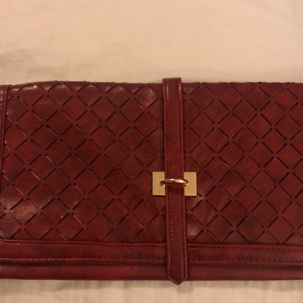 Dark red leather clutch